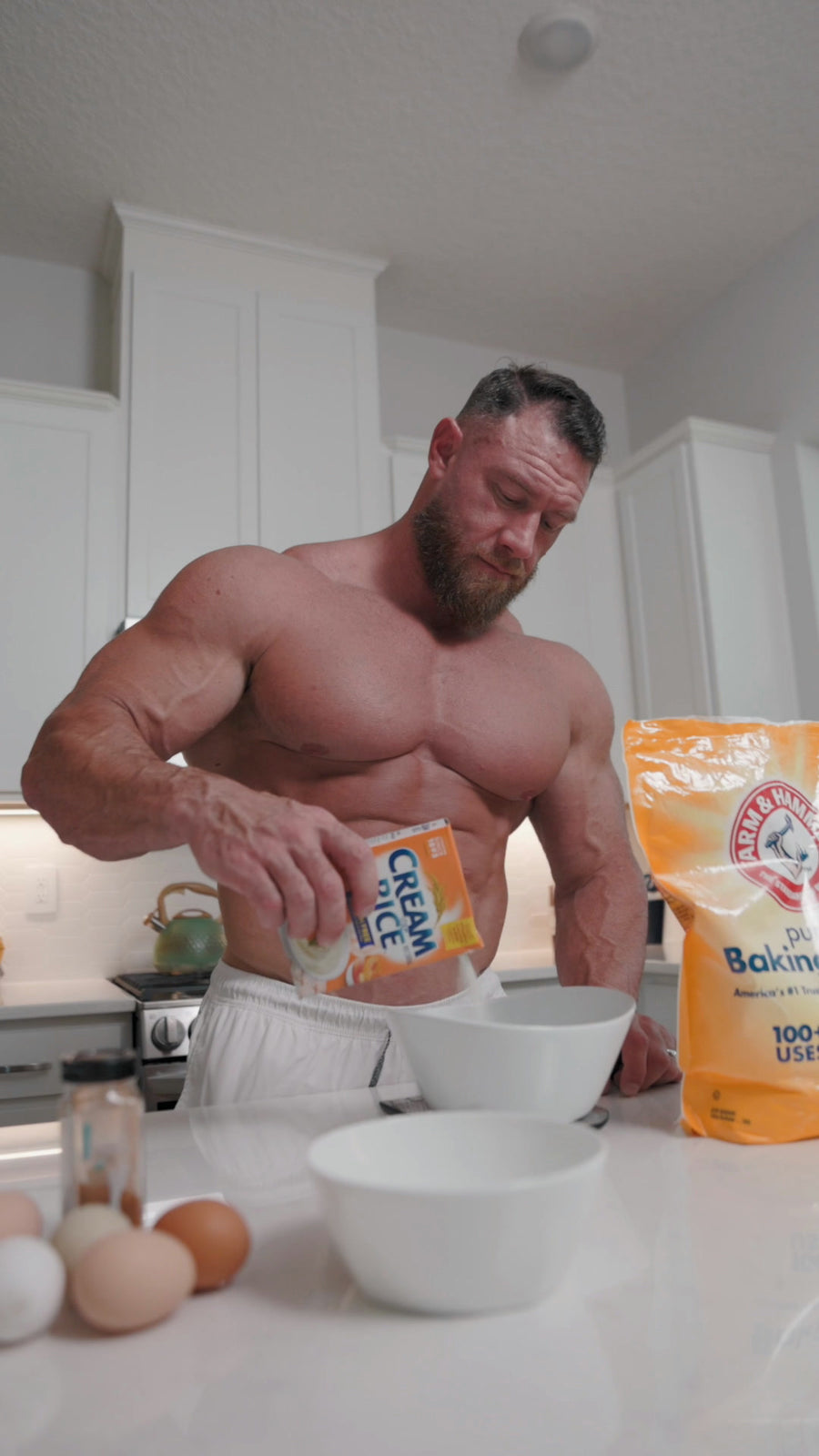 Cream of rice pouring into the pre-workout bowl