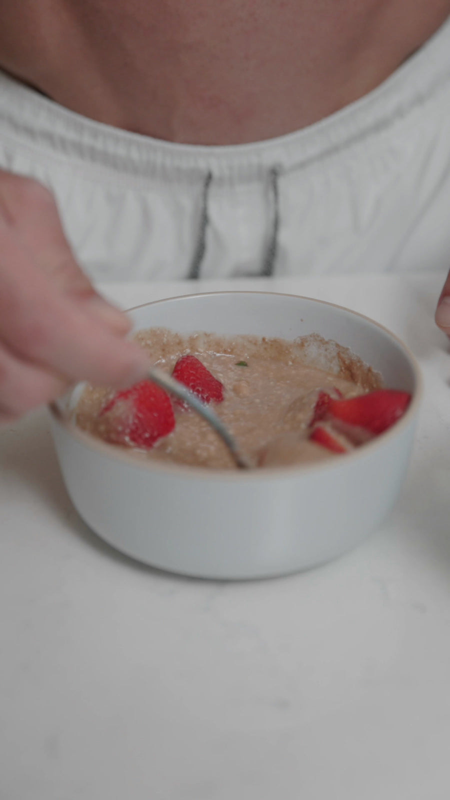 Finished chocolate yogurt bowl topped with strawberries
